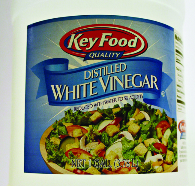 Рис. 14.9. Бутыль белого дистиллированного уксуса Key Food, разбавленного водой до 5 % кислотности.